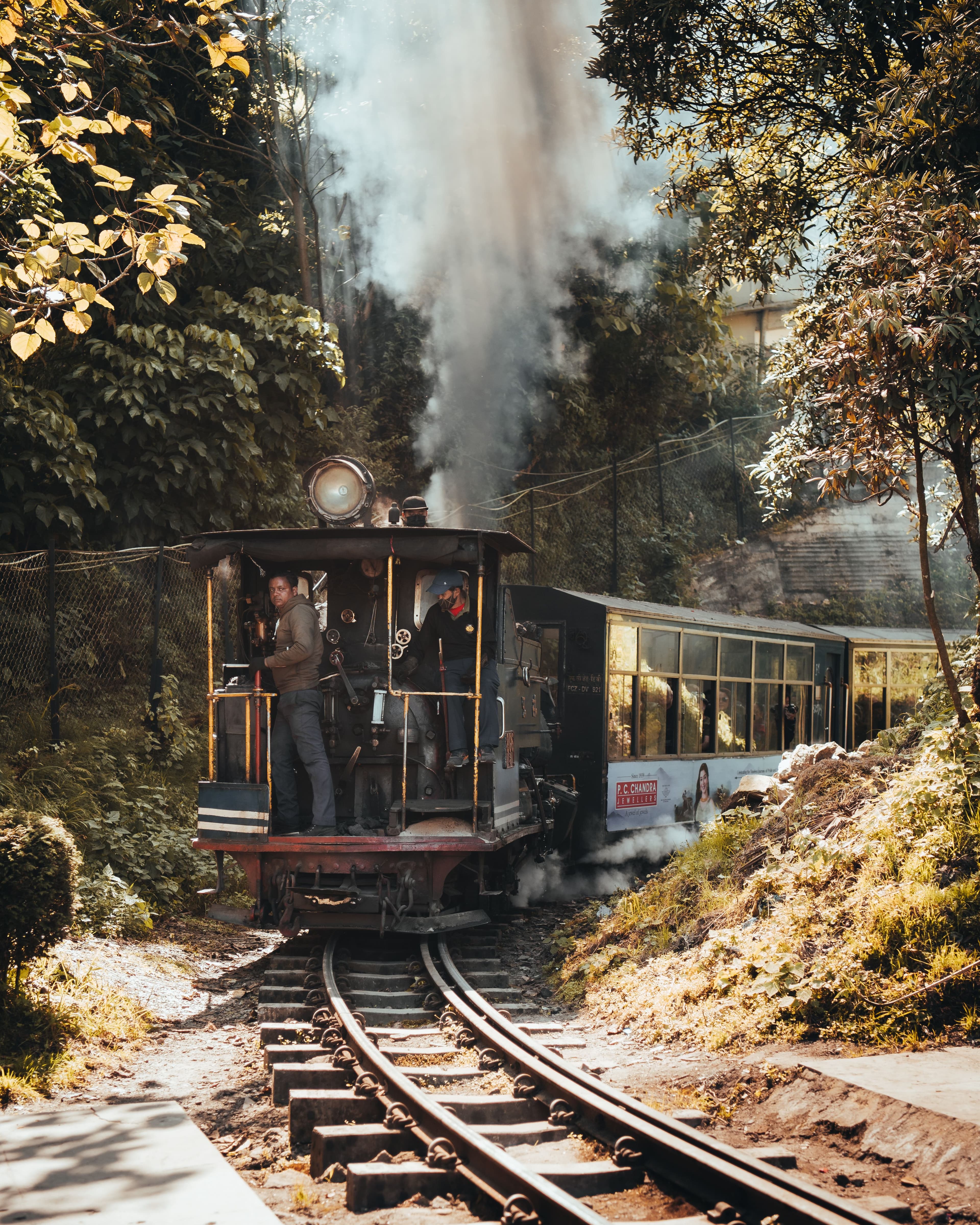 Darjeeling Himalayan Railway toy train winding through hills